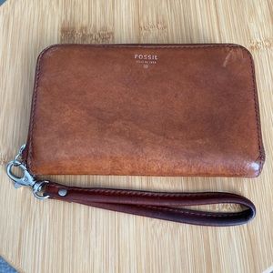 Used Fossil brand leather wristlet.